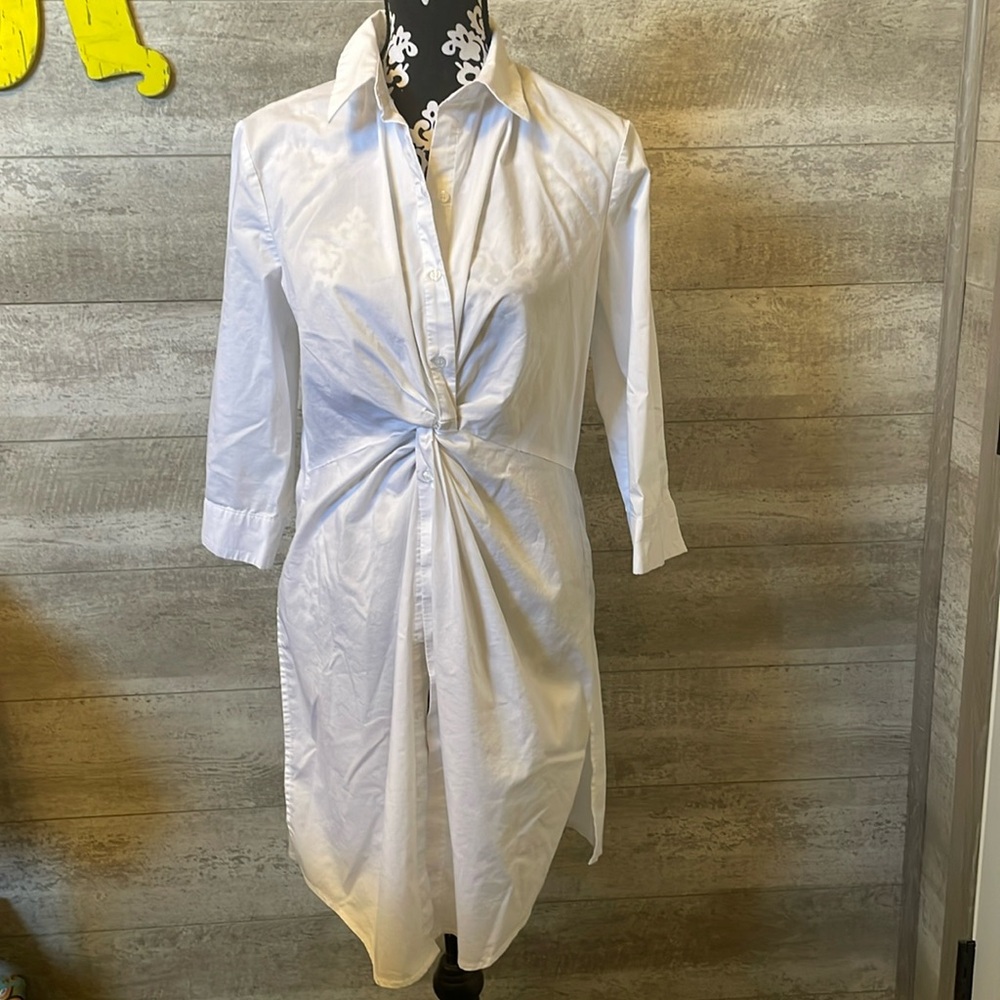 3/4 sleeve white button up shirt.
